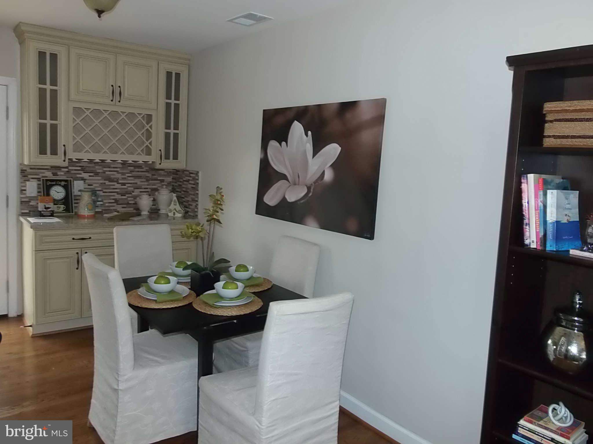 422 Paradise Road Riva, MD 21140 - Photo 22 of 30 a view of a workspace with furniture and wooden floor