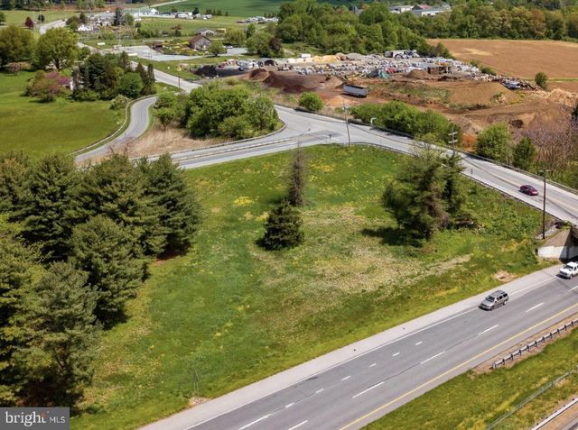 a view of a lake with a yard