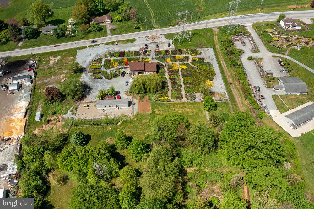 410 Limestone Road Oxford, PA 19363 - Photo 9 of 11 a view of swimming pool with a yard and potted plants