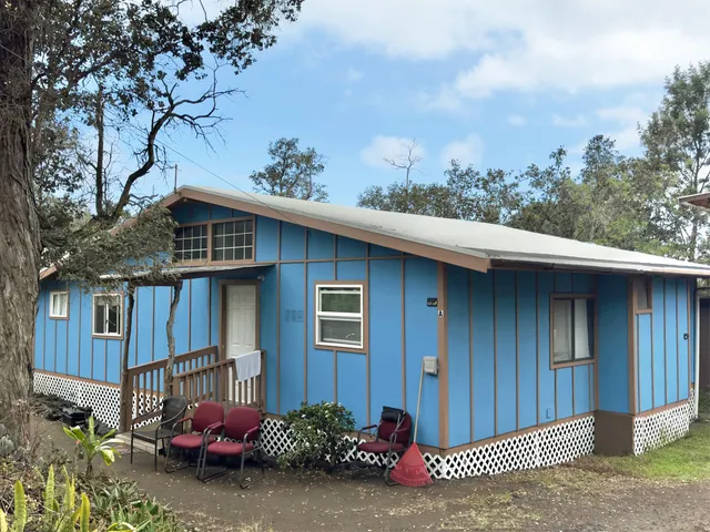 a room with furniture and a large window