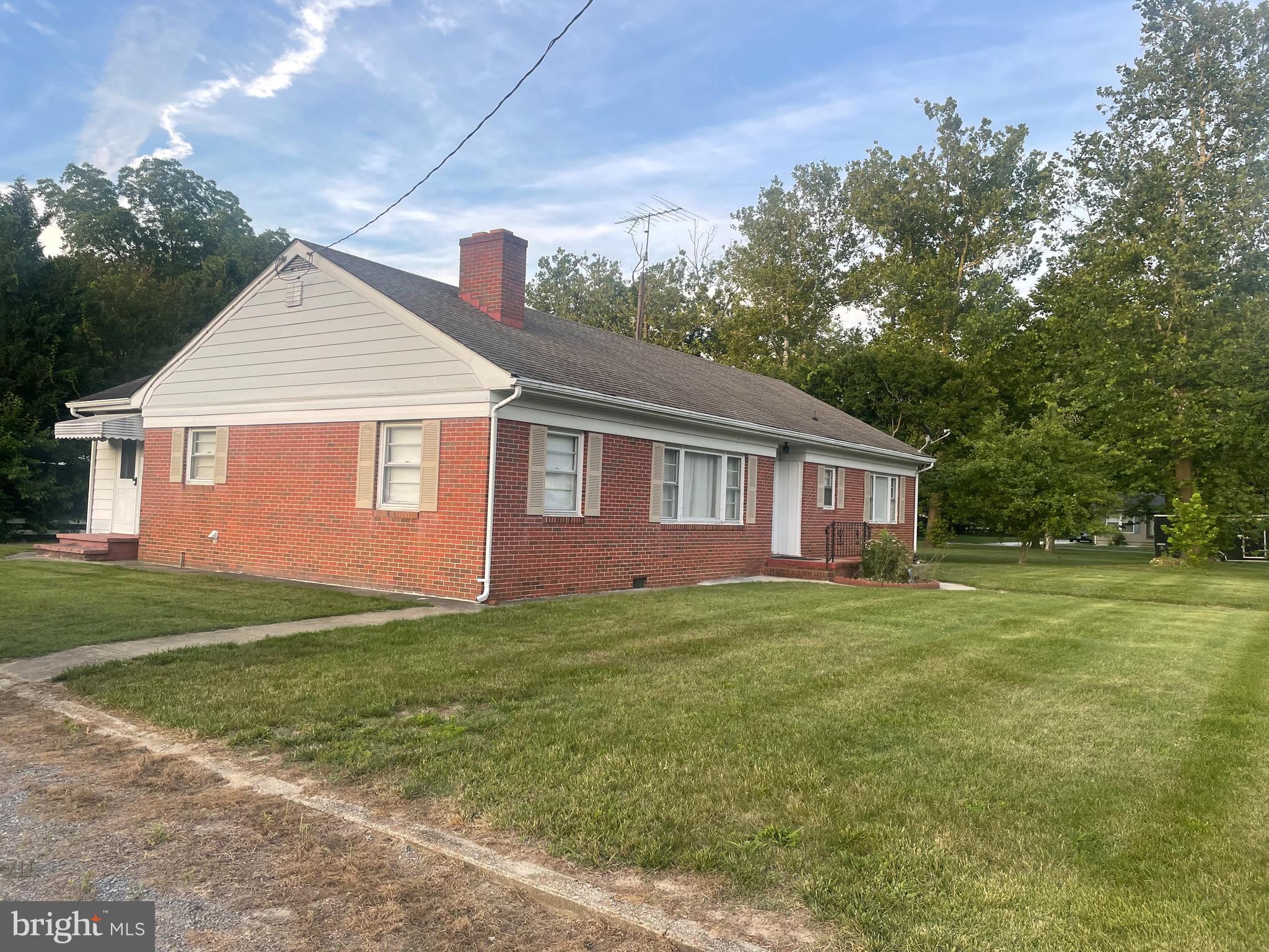 709 Randolph Street Denton, MD 21629 - Photo 2 of 10 Side of House with Multiple Car Driveway