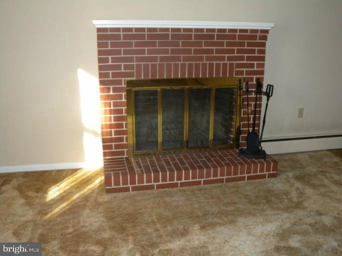 709 Randolph Street Denton, MD 21629 - Photo 3 of 10 Fireplace in Living Room