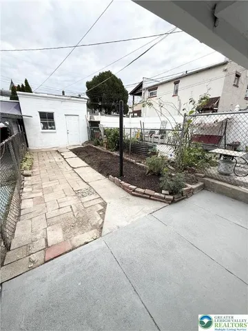 a view of a street with cars