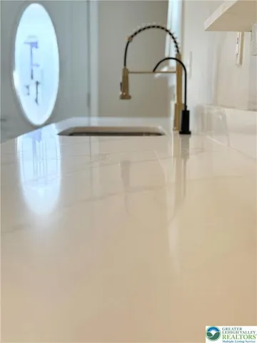 a picture of a bench in a bathroom