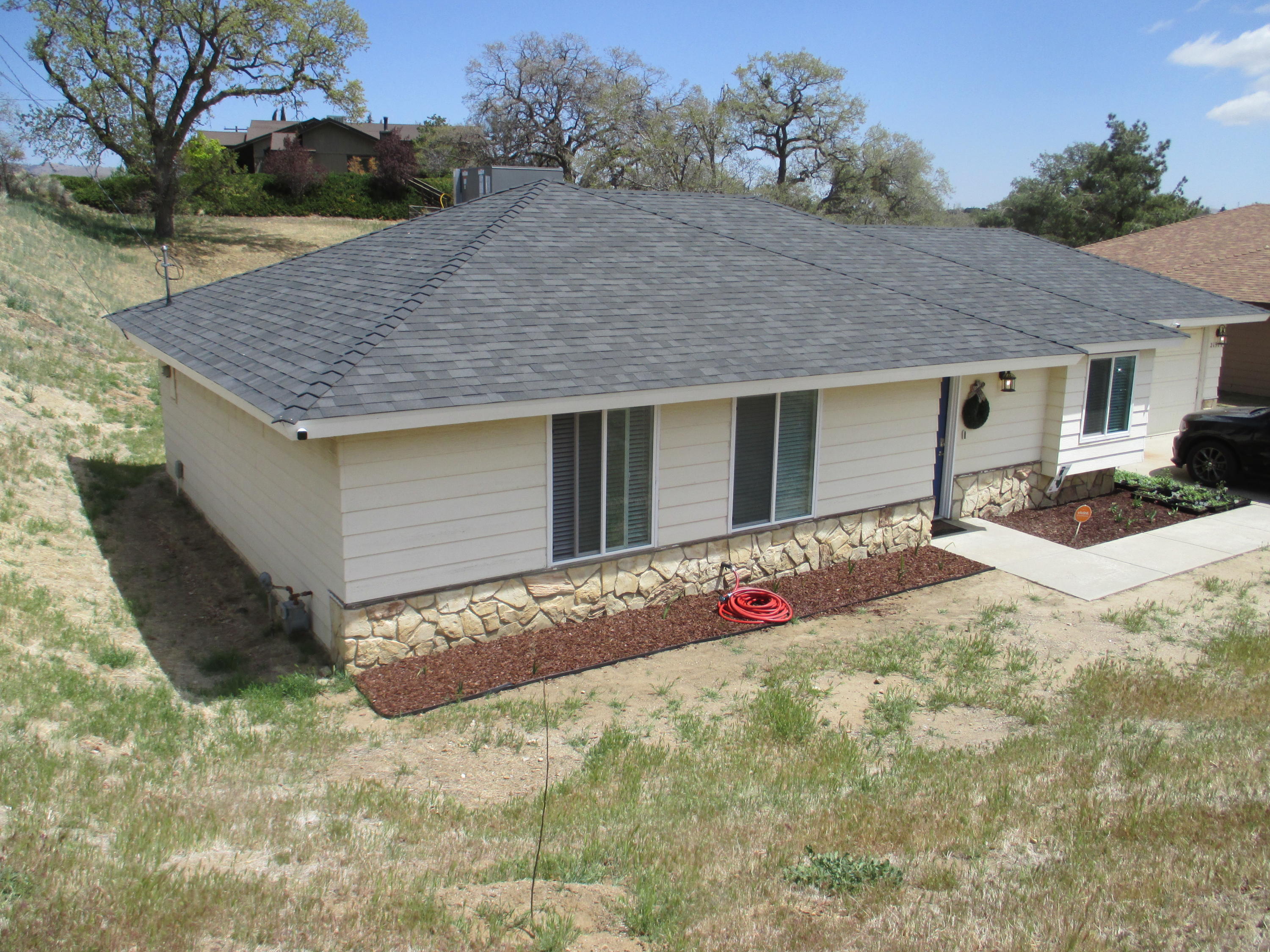 21908 Mariposa Road Tehachapi, CA 93561 - Photo 1 of 23 a view of a house with a yard
