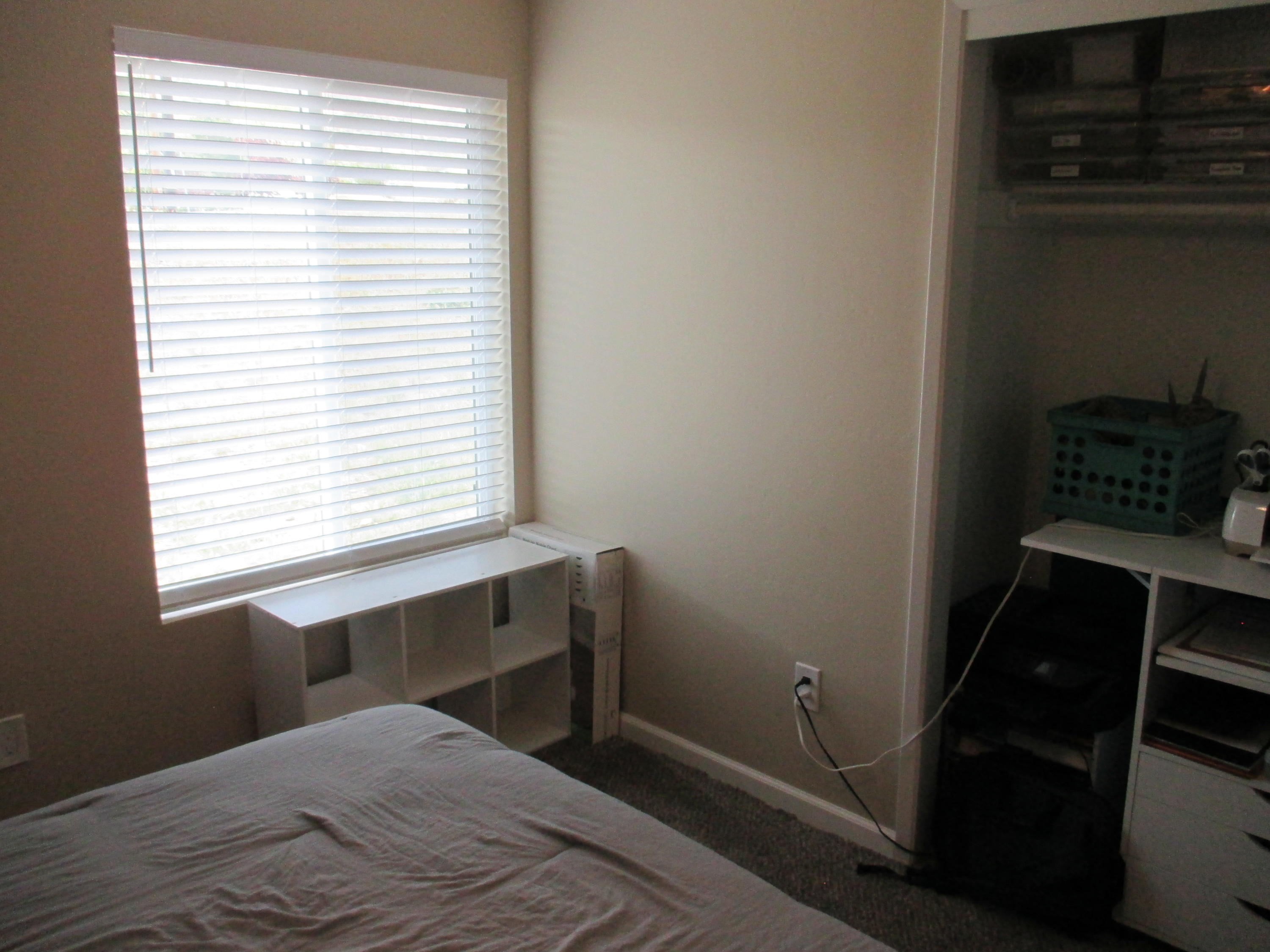 21908 Mariposa Road Tehachapi, CA 93561 - Photo 17 of 23 a bedroom with a bed and a window