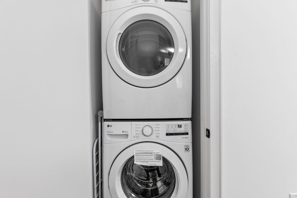 2709 East 5th Street, Unit 1306 Austin, TX 78702 - Photo 13 of 26 A dedicated, stackable washer/dryer space tucked into convenient closet.