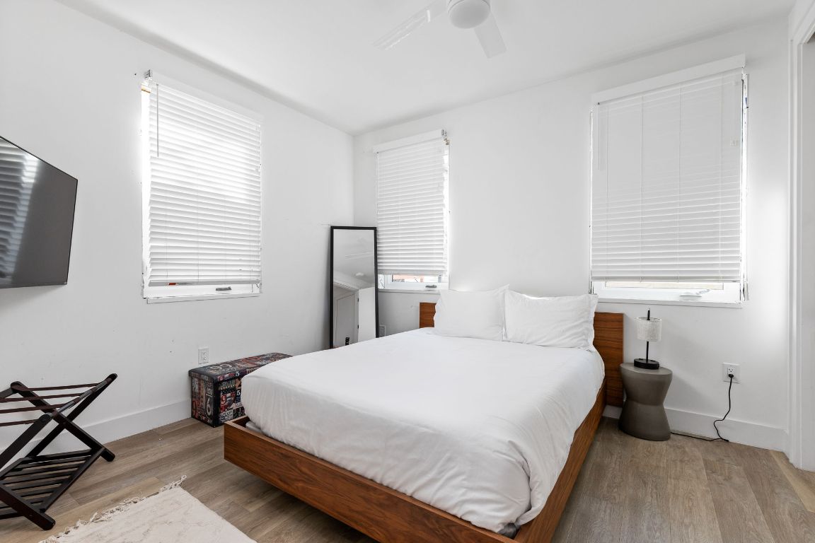 2709 East 5th Street, Unit 1306 Austin, TX 78702 - Photo 18 of 26 Light-filled rooms are perfect fo guests and family alike.