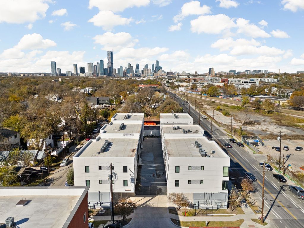 2709 East 5th Street, Unit 1306 Austin, TX 78702 - Photo 21 of 26 Aerial view of East Austin with the downtown skyline just beyond.