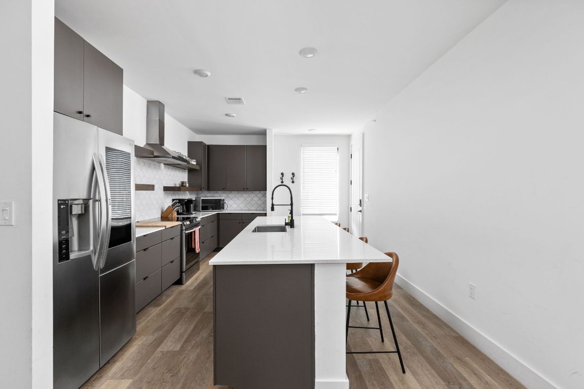 2709 East 5th Street, Unit 1306 Austin, TX 78702 - Photo 7 of 26 Seamless connection to dining and living areas.