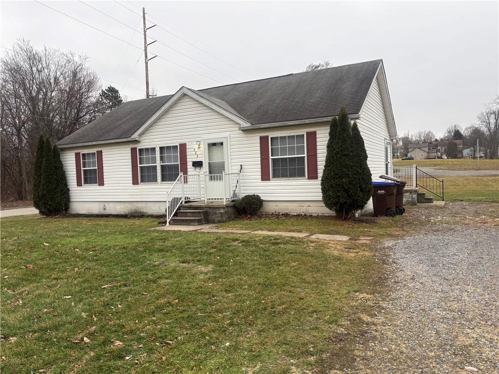 903 Union Street Farrell, PA 16121 - Photo 2 of 29 a front view of a house with a garden