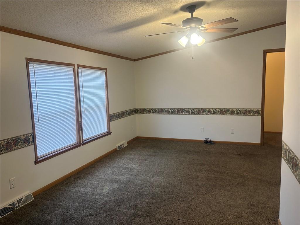903 Union Street Farrell, PA 16121 - Photo 4 of 29 an empty room with chandelier fan