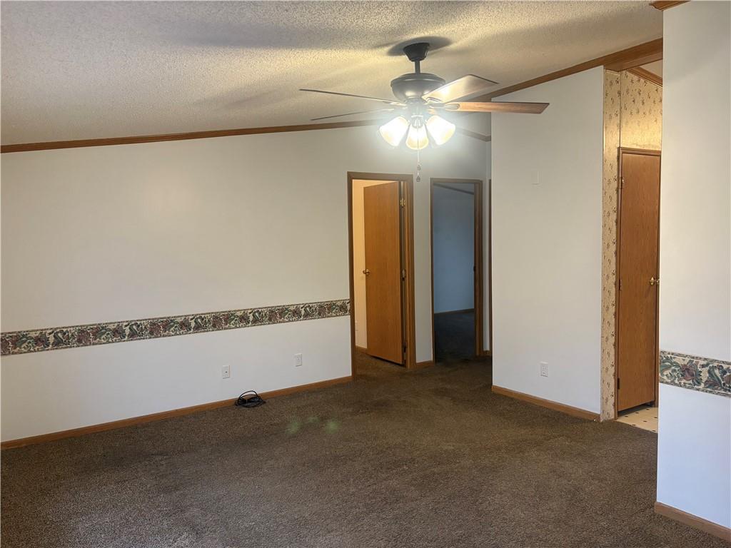 903 Union Street Farrell, PA 16121 - Photo 5 of 29 a view of a room with chandelier fan and windows