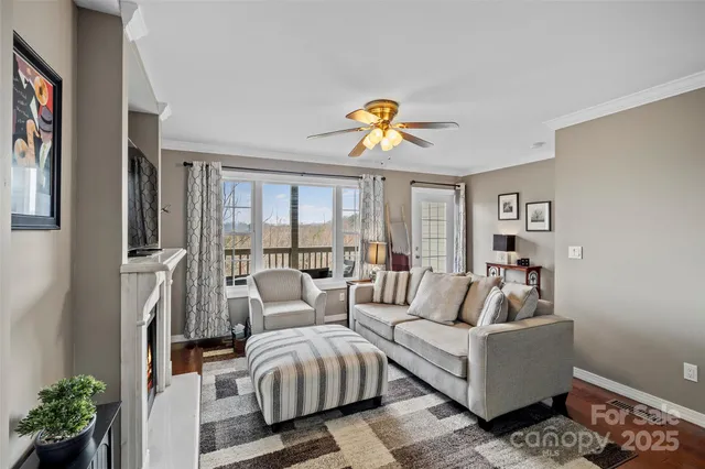 a bed room with a bed a fireplace and a television