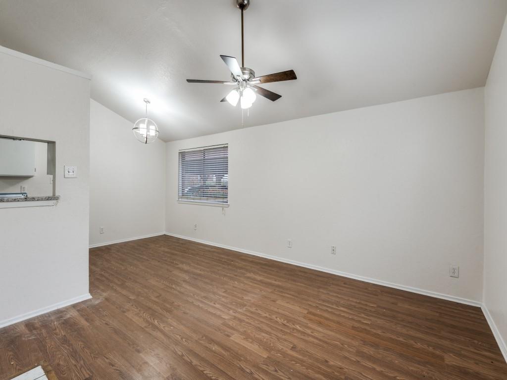 2240 Tarpley Road, Unit 462 Carrollton, TX 75006 - Photo 4 of 12 a view of empty room with wooden floor