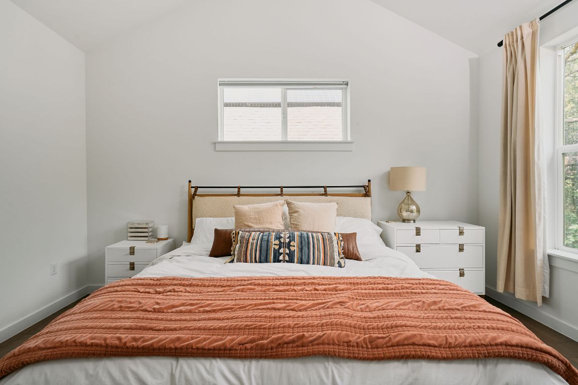 3001 Del Curto Road, Unit 14 Austin, TX 78704 - Photo 8 of 18 a bedroom with a bed and window