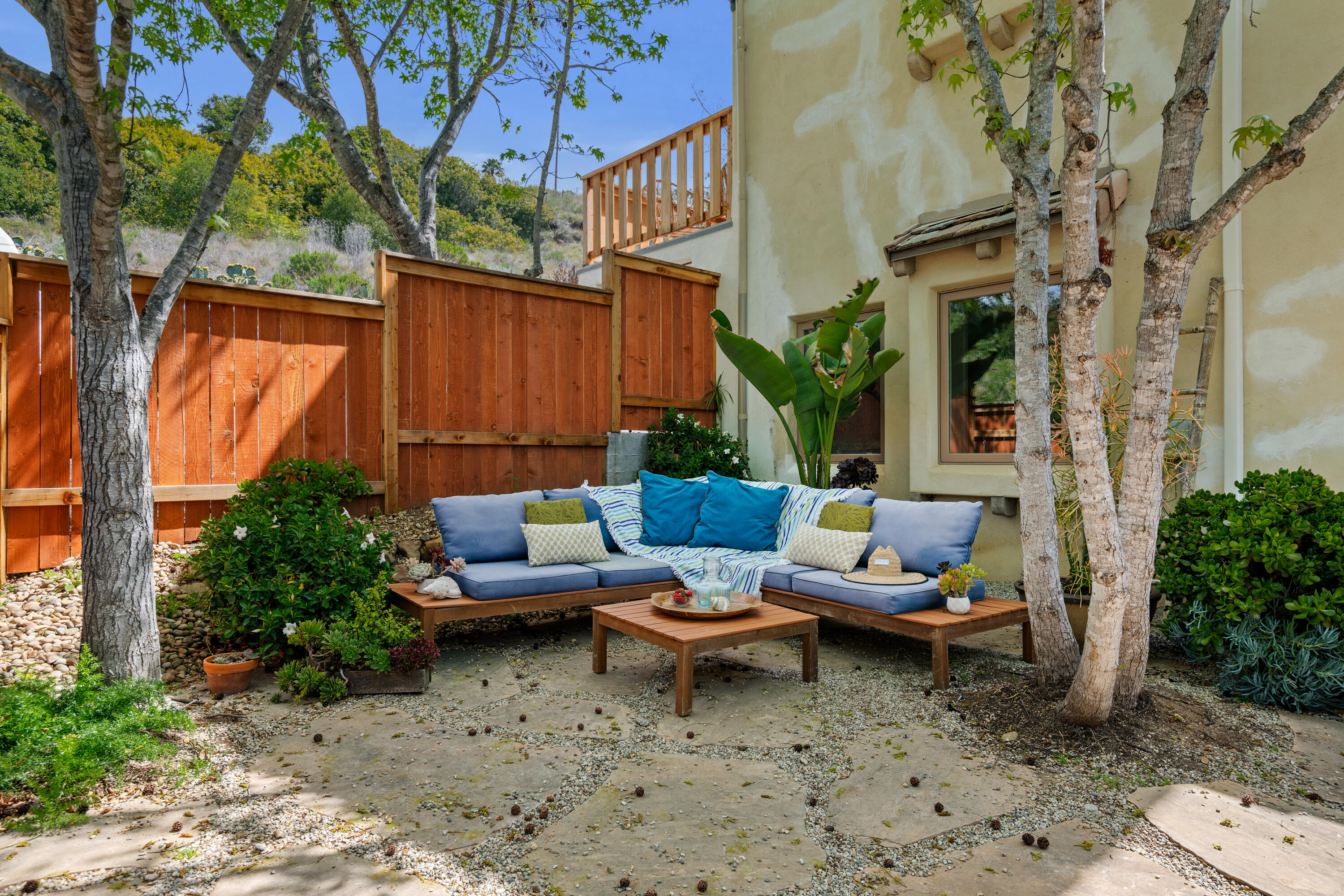 Undisclosed Address Santa Barbara, CA 93111 - Photo 17 of 20 a backyard of a house with fountain table and chairs