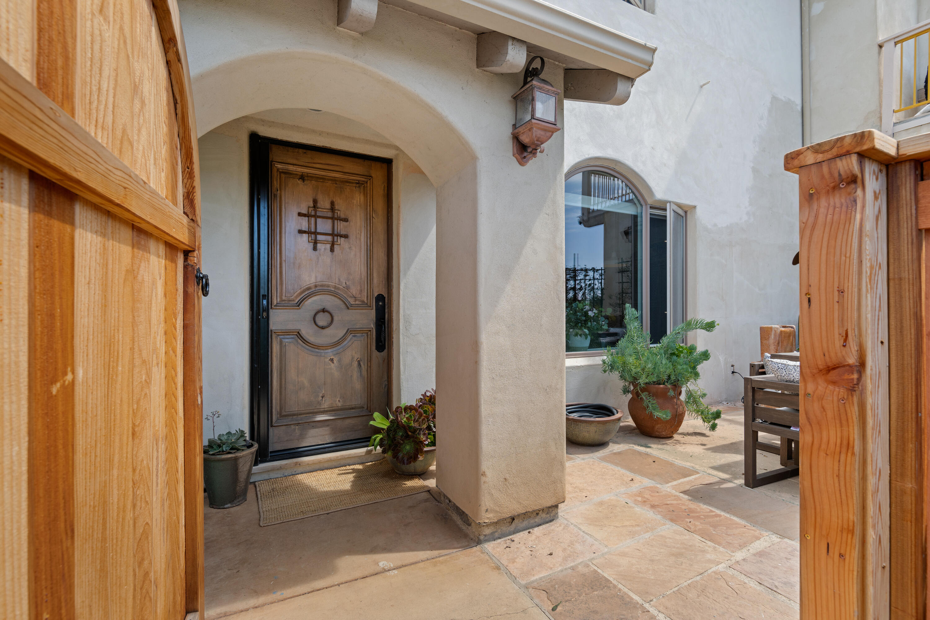 Undisclosed Address Santa Barbara, CA 93111 - Photo 20 of 20 a view of a house with porch and furniture