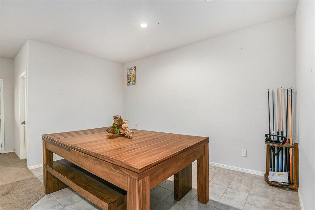 805 Durango Lane Cleburne, TX 76033 - Photo 11 of 23 a dining room with table and chair