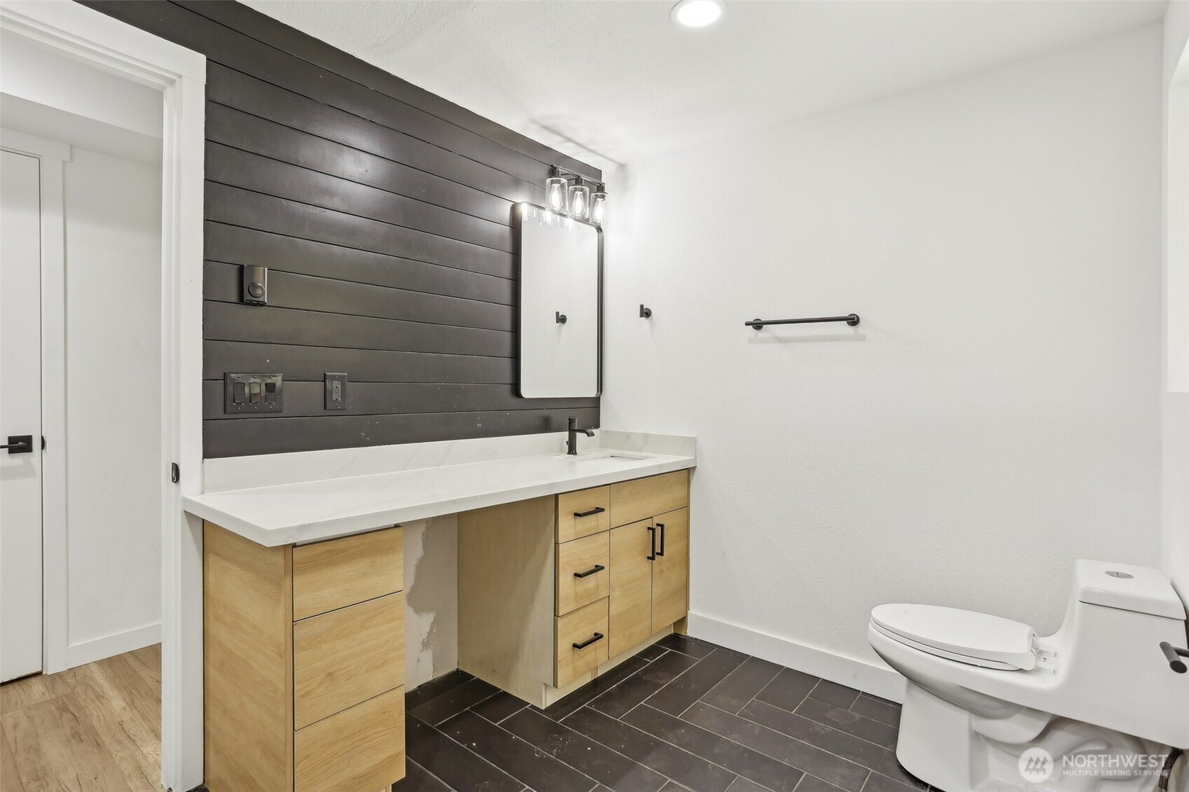 2531 Smithers Avenue South Renton, WA 98055 - Photo 18 of 24 a bathroom with a sink toilet vanity and tub