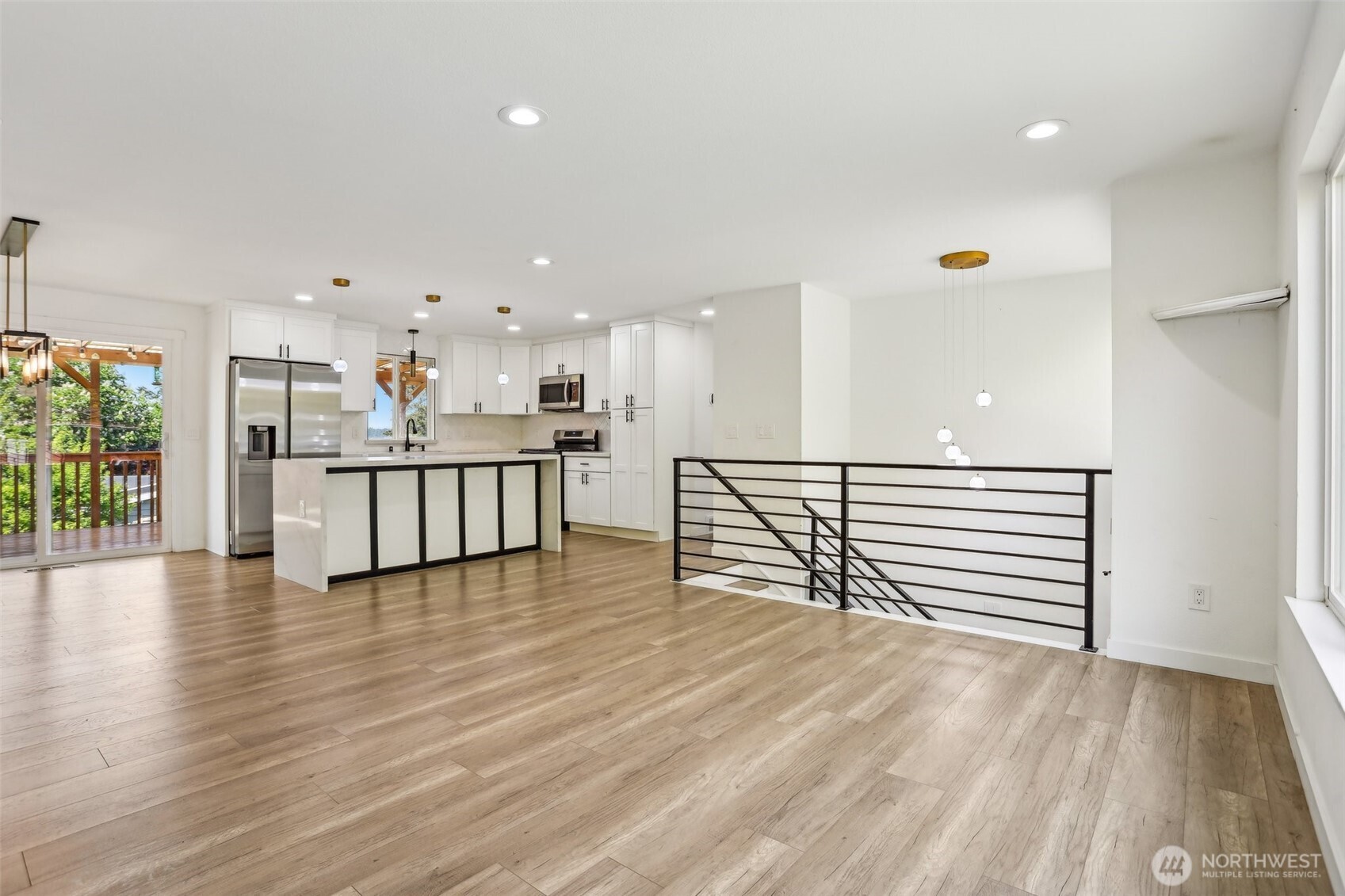 2531 Smithers Avenue South Renton, WA 98055 - Photo 7 of 24 a view of a kitchen with a white wooden cabinets and stairs