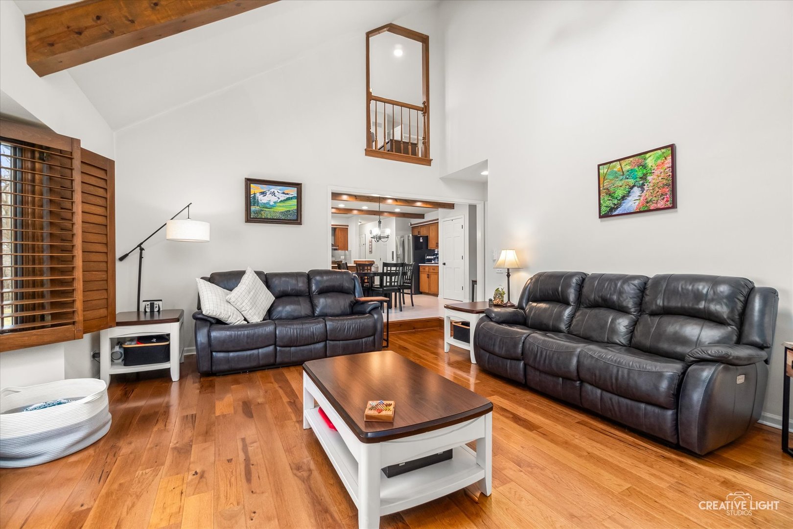 1255 East Bailey Road Naperville, IL 60565 - Photo 12 of 34 a living room with furniture and a wooden floor