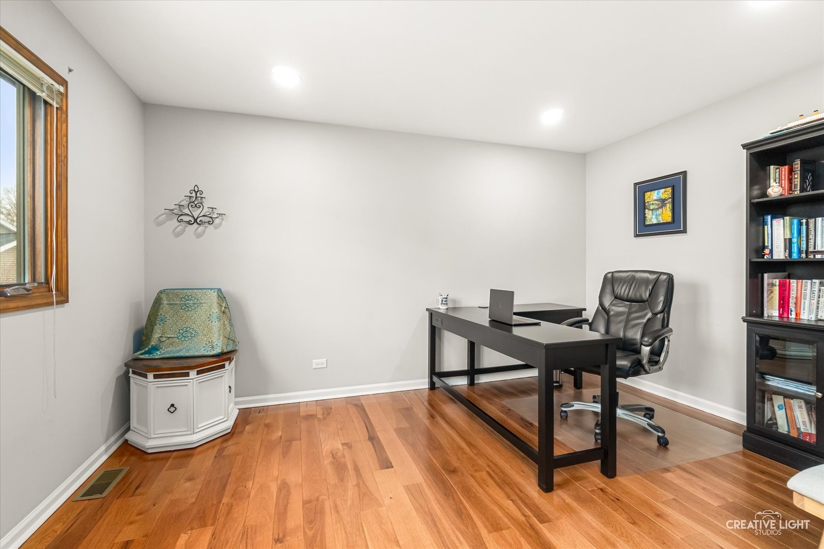 1255 East Bailey Road Naperville, IL 60565 - Photo 19 of 34 a workspace with furniture and wooden floor