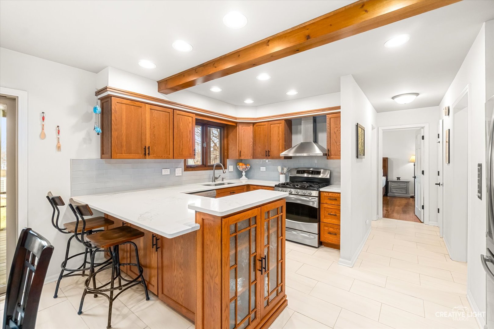 1255 East Bailey Road Naperville, IL 60565 - Photo 5 of 34 a kitchen with stainless steel appliances granite countertop a stove a sink dishwasher and a refrigerator