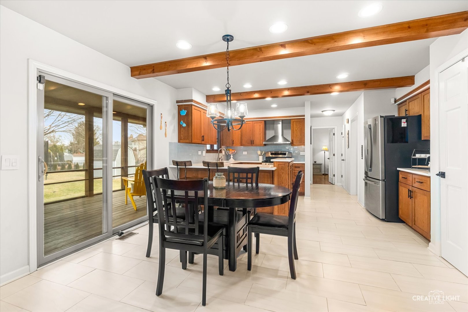 1255 East Bailey Road Naperville, IL 60565 - Photo 7 of 34 a dining hall with stainless steel appliances a dining table and chairs