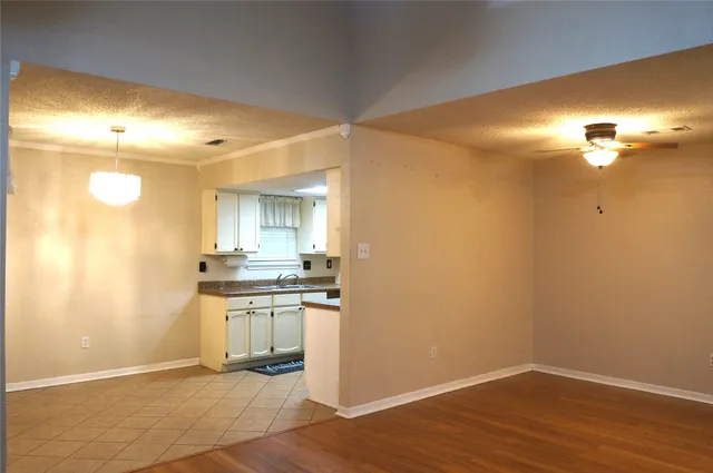 a view of a kitchen with a sink