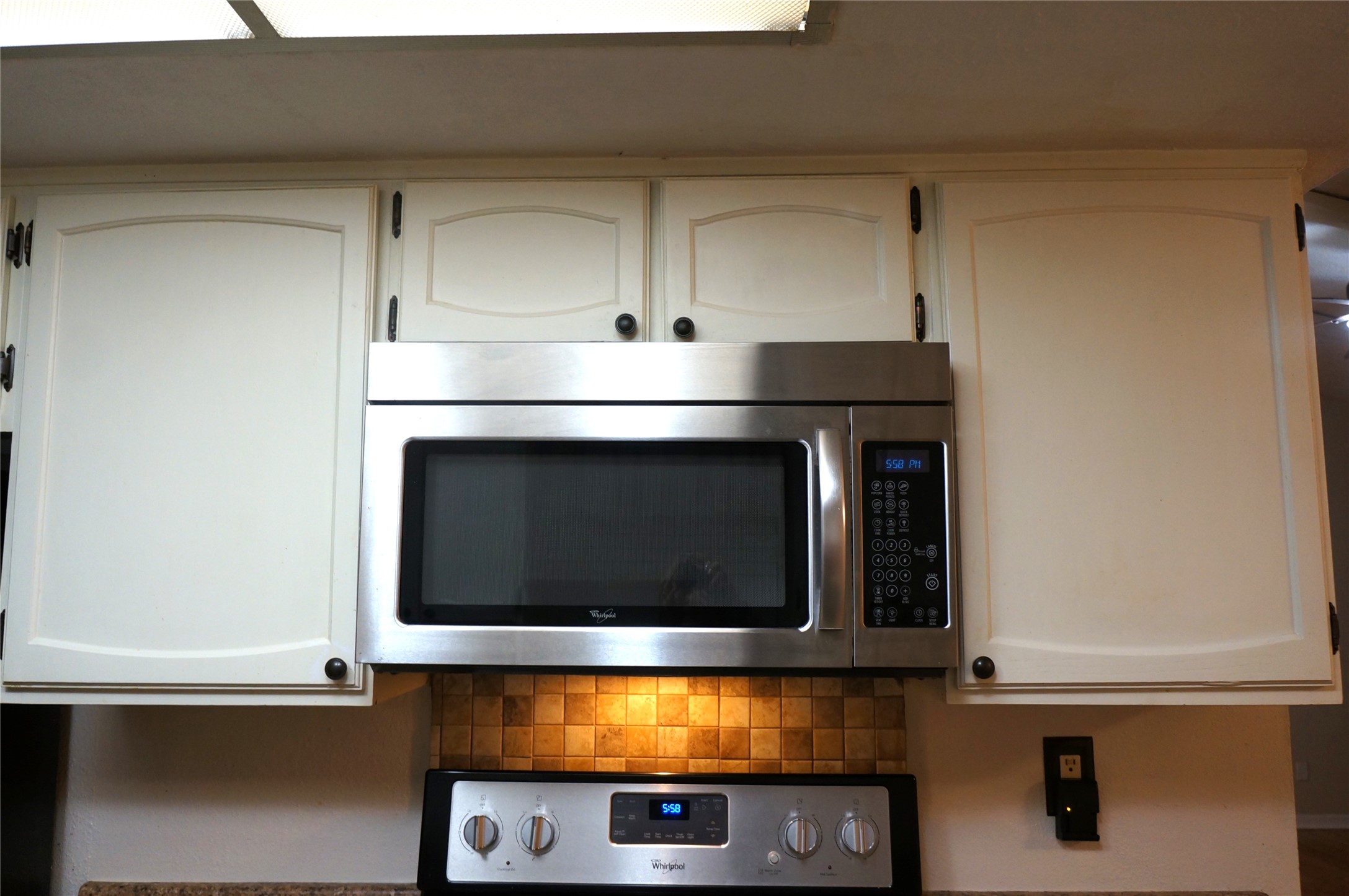 718 Silverpines Road Houston, TX 77062 - Photo 20 of 49 a stove top oven sitting inside of a kitchen