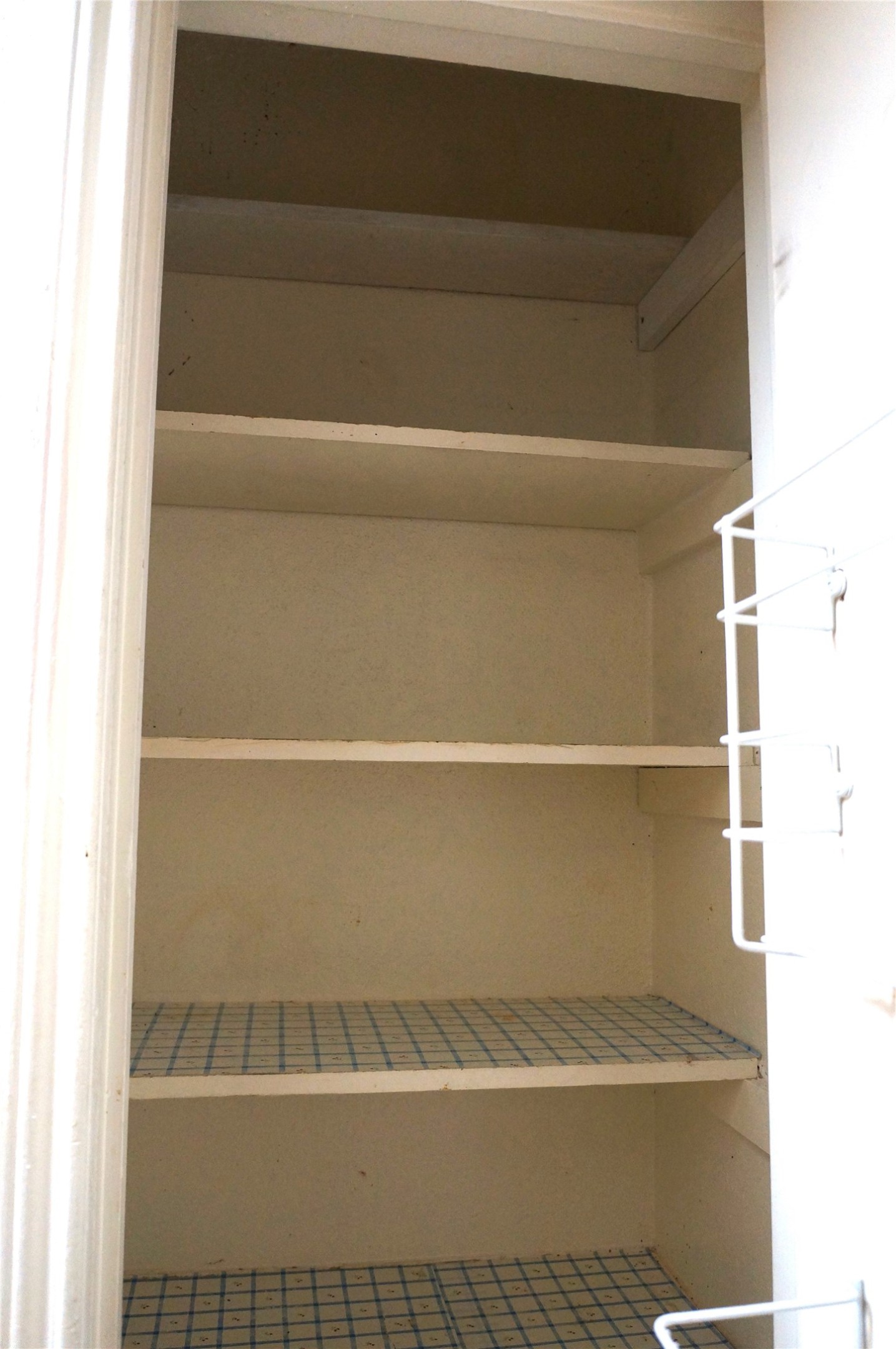 718 Silverpines Road Houston, TX 77062 - Photo 21 of 49 a view of walk in closet with empty racks