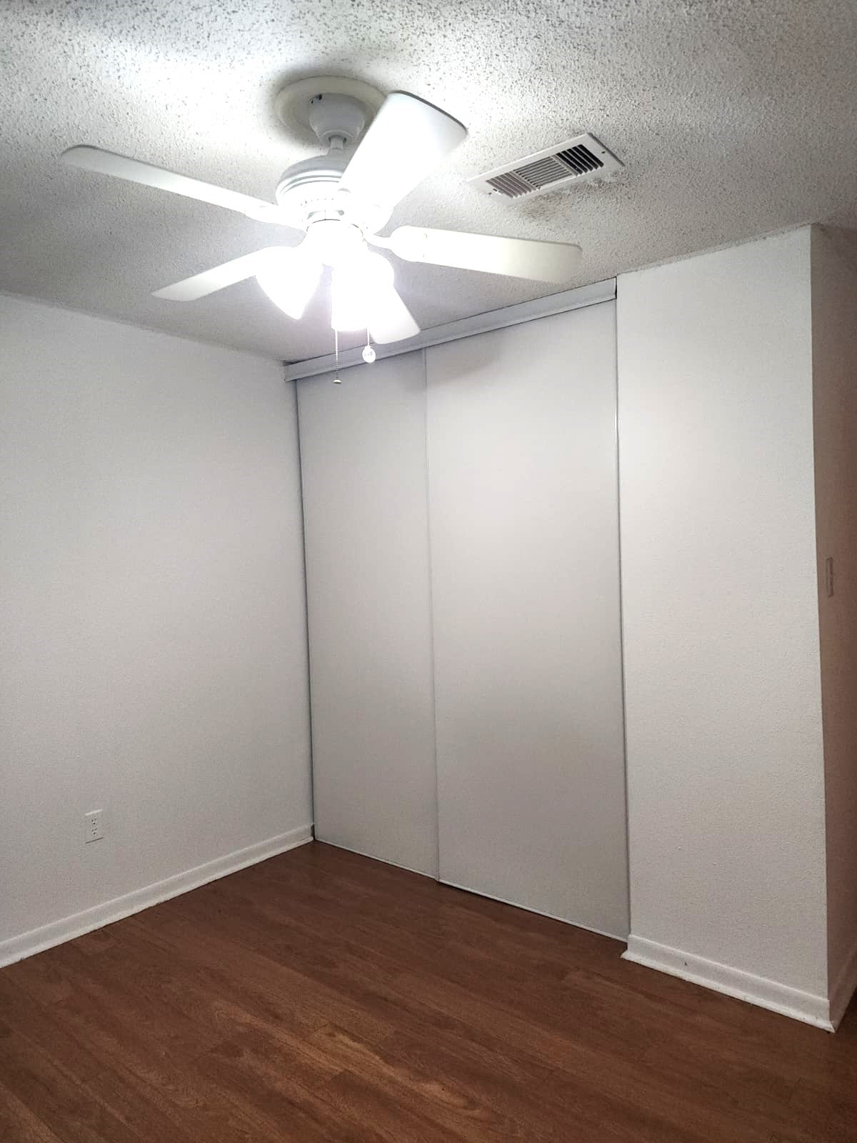 718 Silverpines Road Houston, TX 77062 - Photo 35 of 49 a view of an empty room with wooden floor