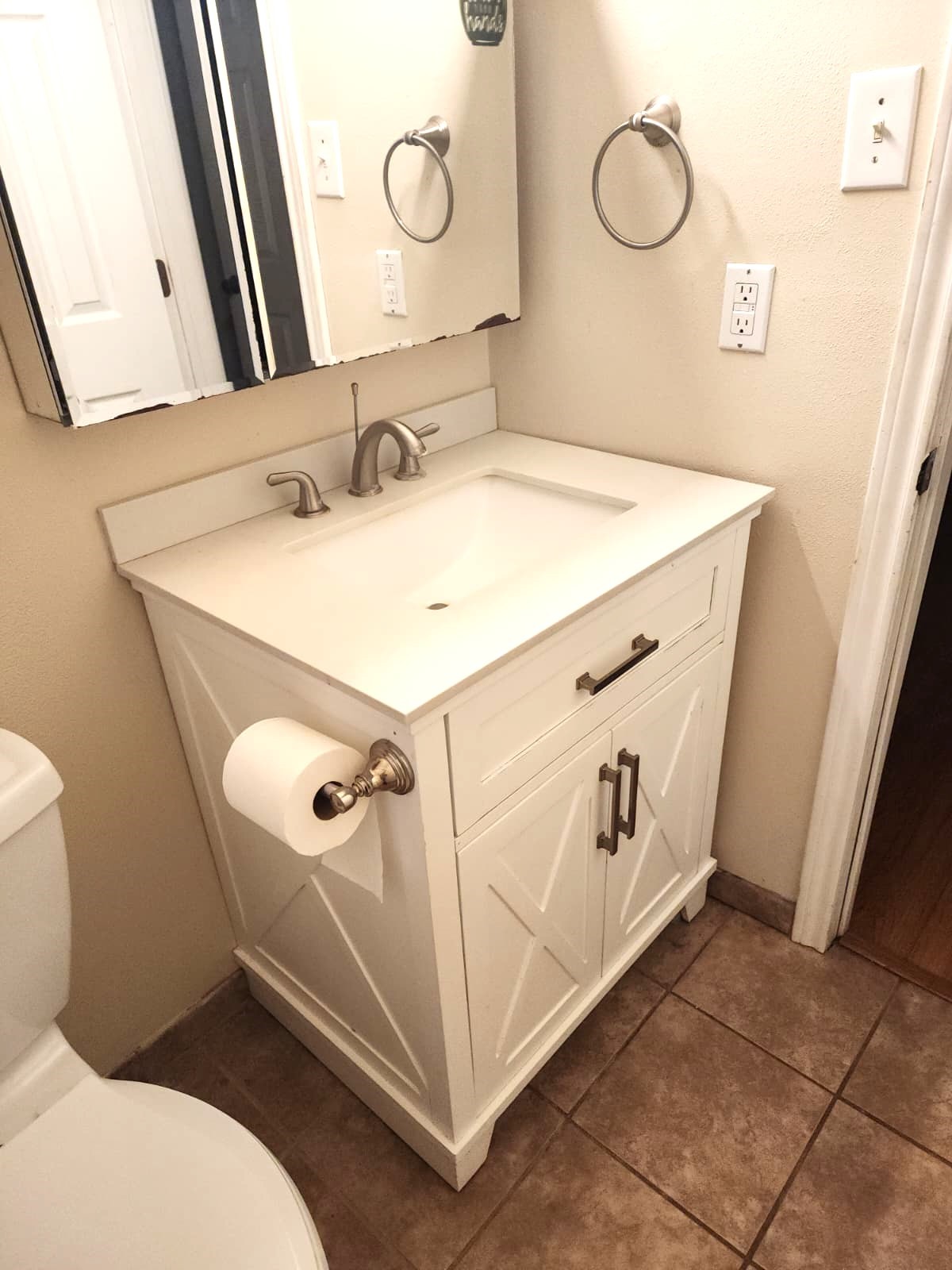 718 Silverpines Road Houston, TX 77062 - Photo 37 of 49 a bathroom with a sink a toilet and mirror