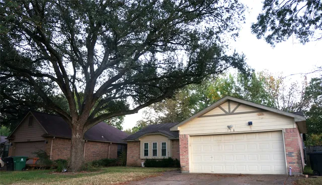 a small white house with a outdoor space