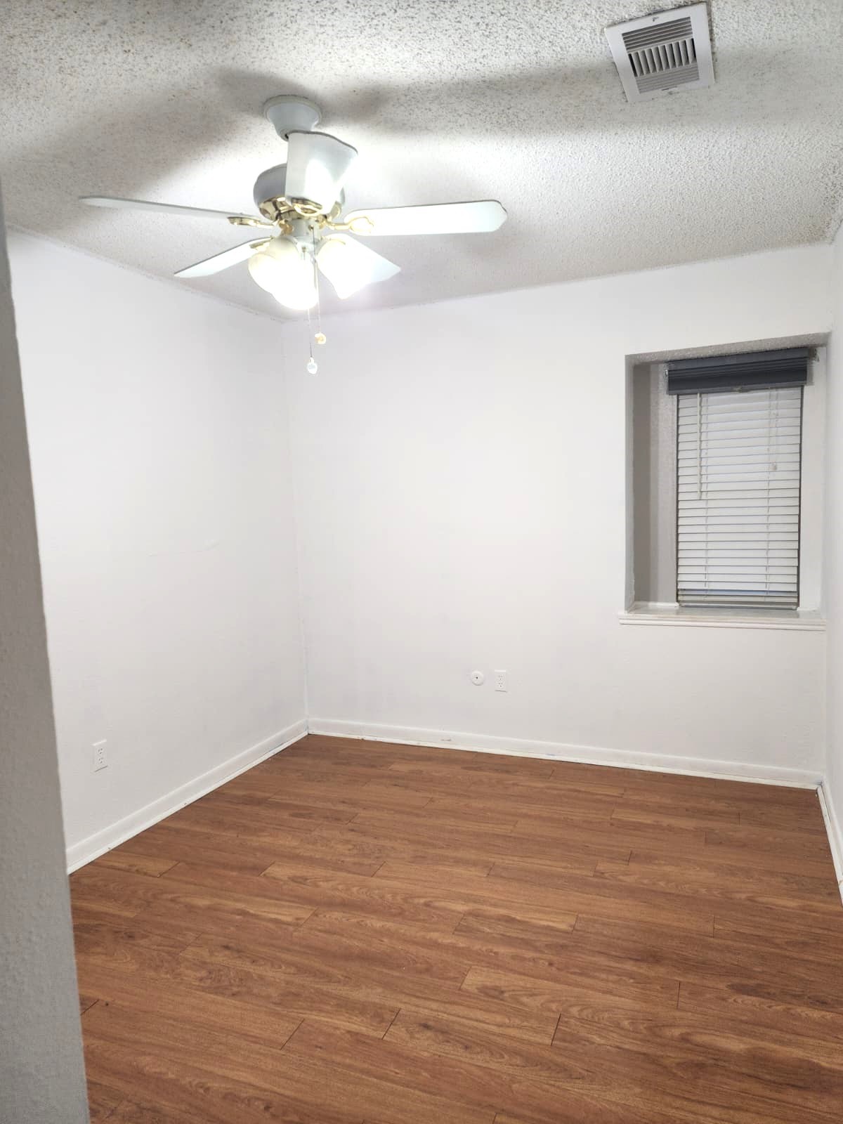 718 Silverpines Road Houston, TX 77062 - Photo 42 of 49 a view of a room with wooden floor
