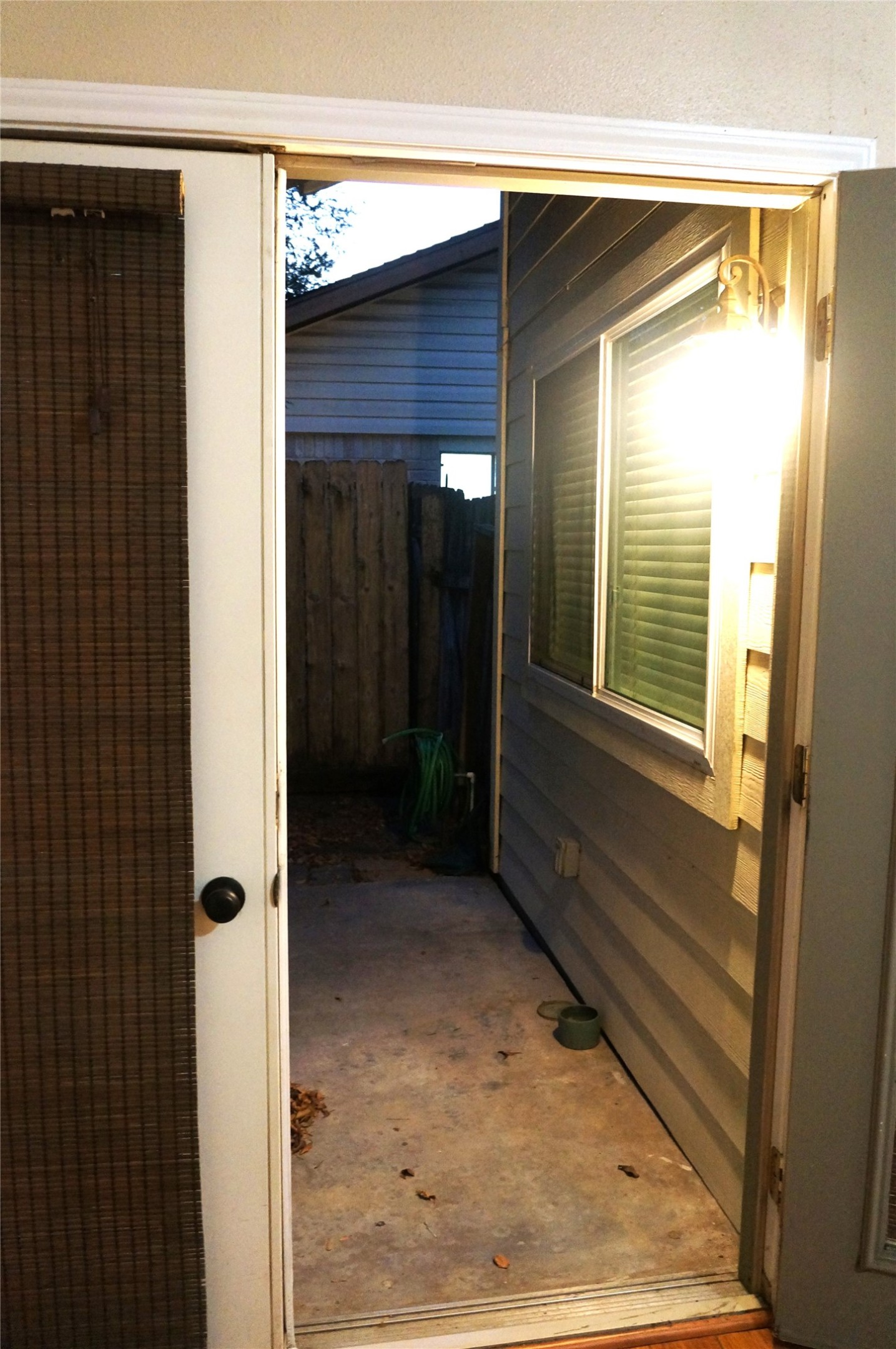 718 Silverpines Road Houston, TX 77062 - Photo 46 of 49 a view of a porch with a table and chairs