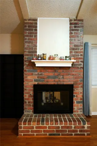 a view of fireplace and utility room