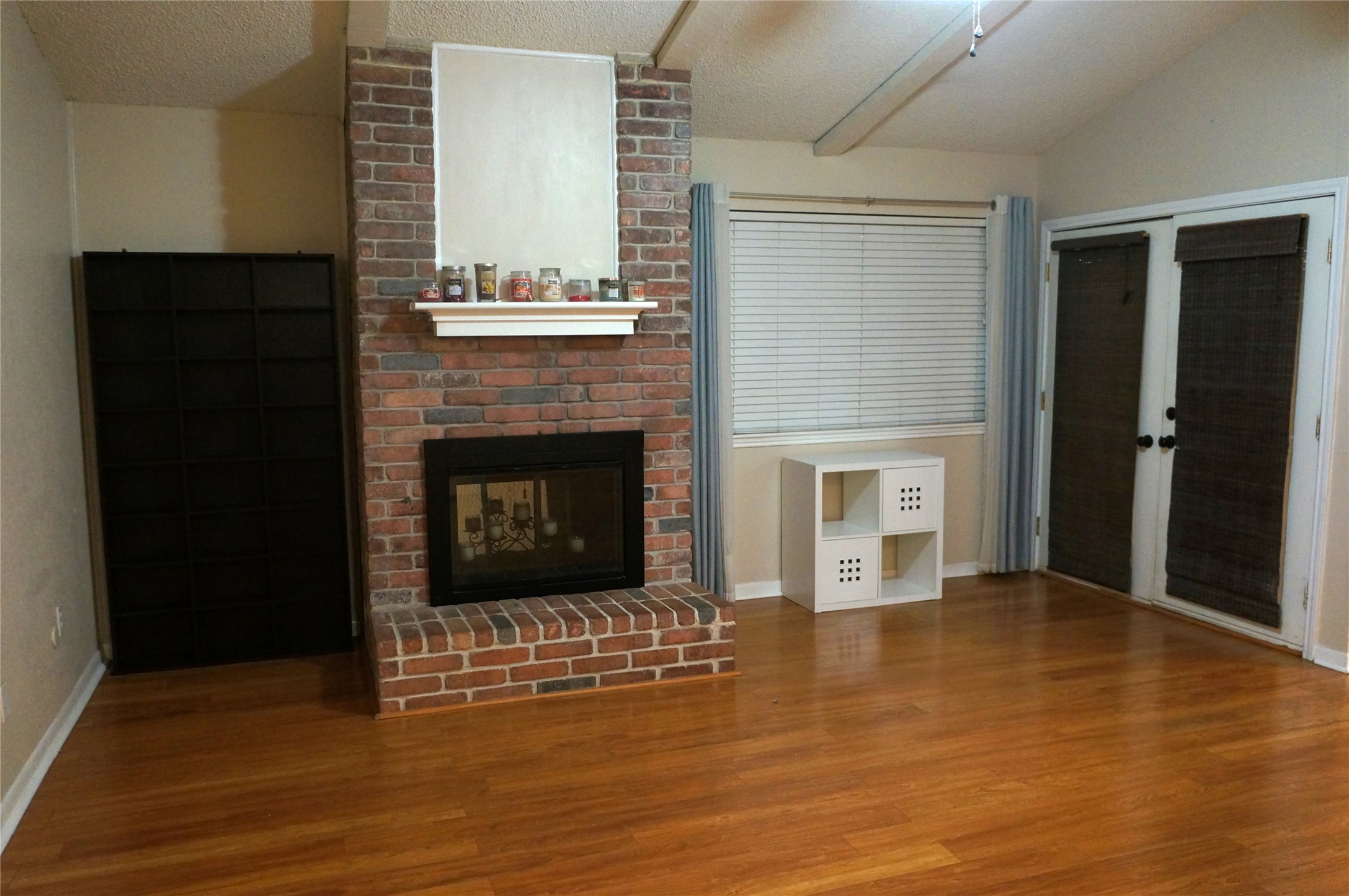 718 Silverpines Road Houston, TX 77062 - Photo 8 of 49 a view of a livingroom with a fireplace and window