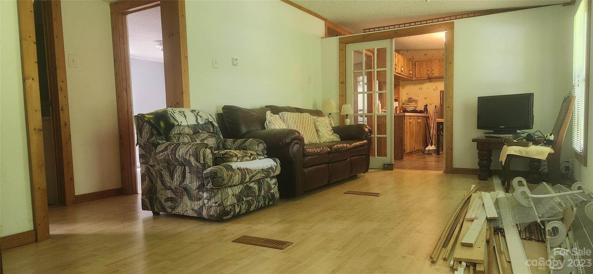 6524 Workman Lane Vale, NC 28168 - Photo 14 of 20 a living room with furniture and a flat screen tv