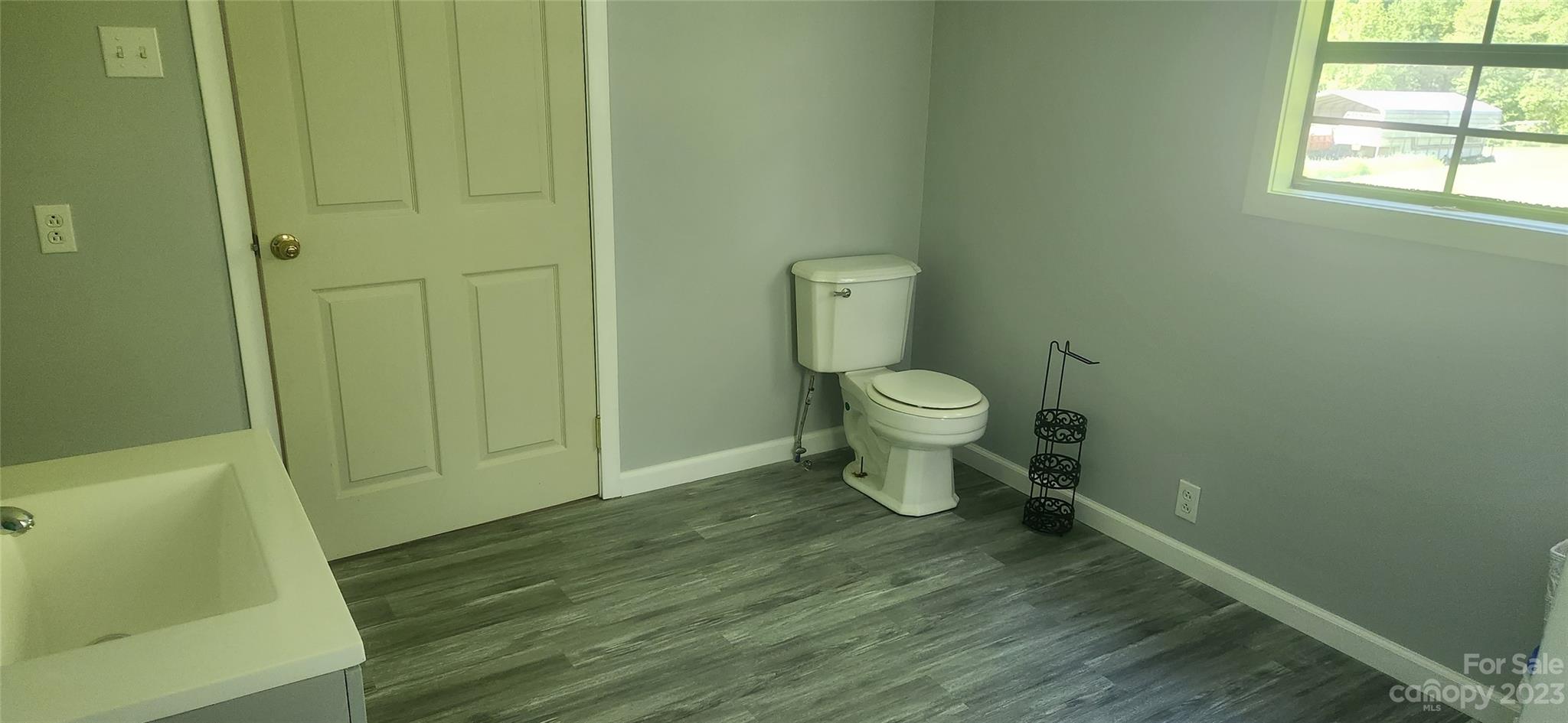 6524 Workman Lane Vale, NC 28168 - Photo 19 of 20 a bathroom with a toilet and a sink