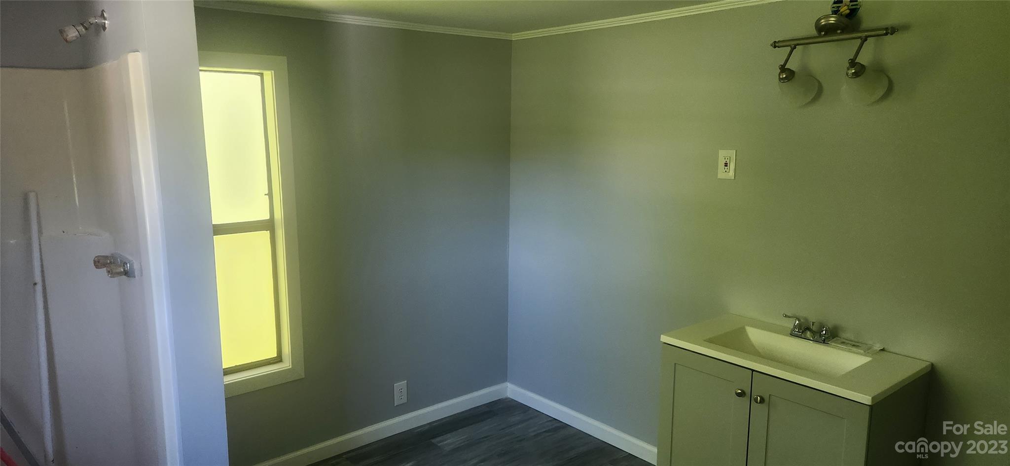 6524 Workman Lane Vale, NC 28168 - Photo 20 of 20 a bathroom with a sink and mirror with toilet