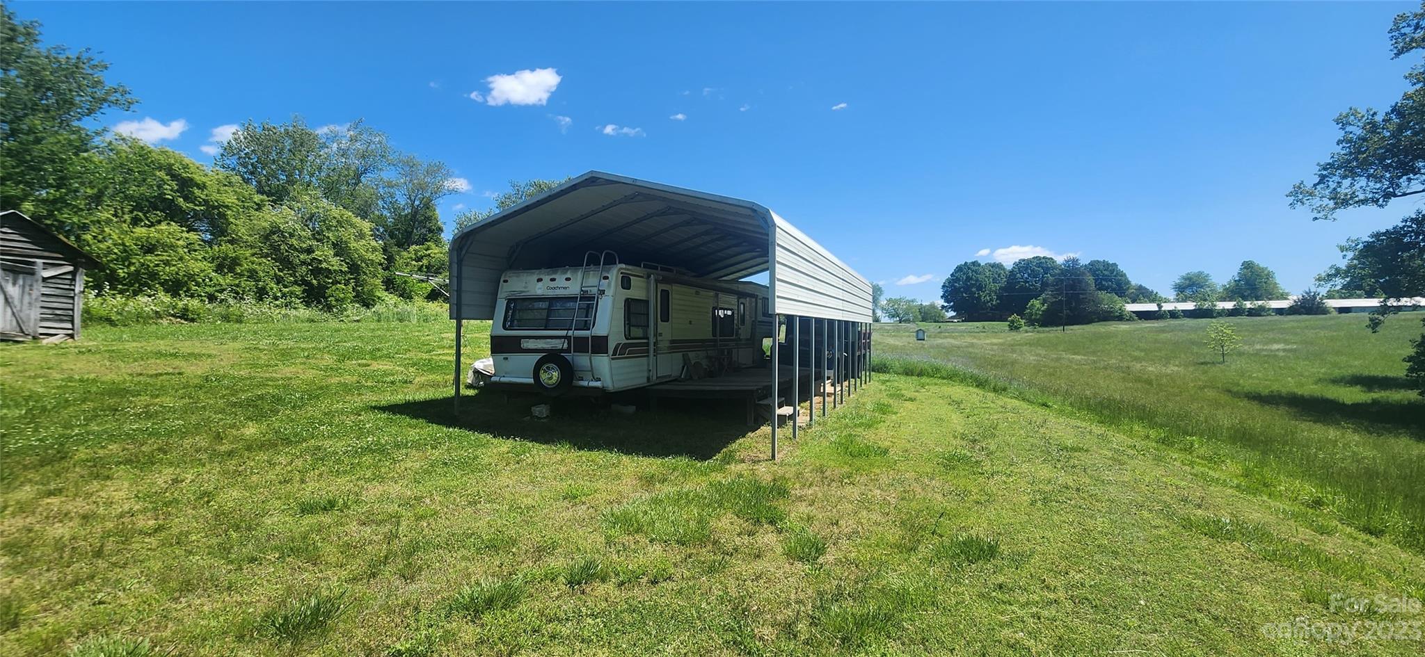 6524 Workman Lane Vale, NC 28168 - Photo 7 of 20 a view of a house with a back yard