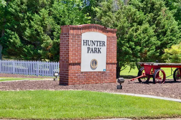 a sign on the side of the house