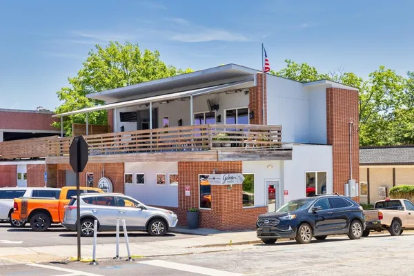a front view of a building with street view