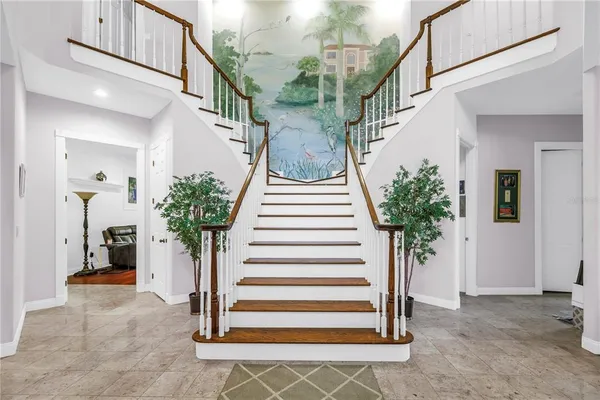 a view of entryway with a front door