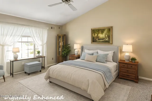 a bedroom with a bed and a couch