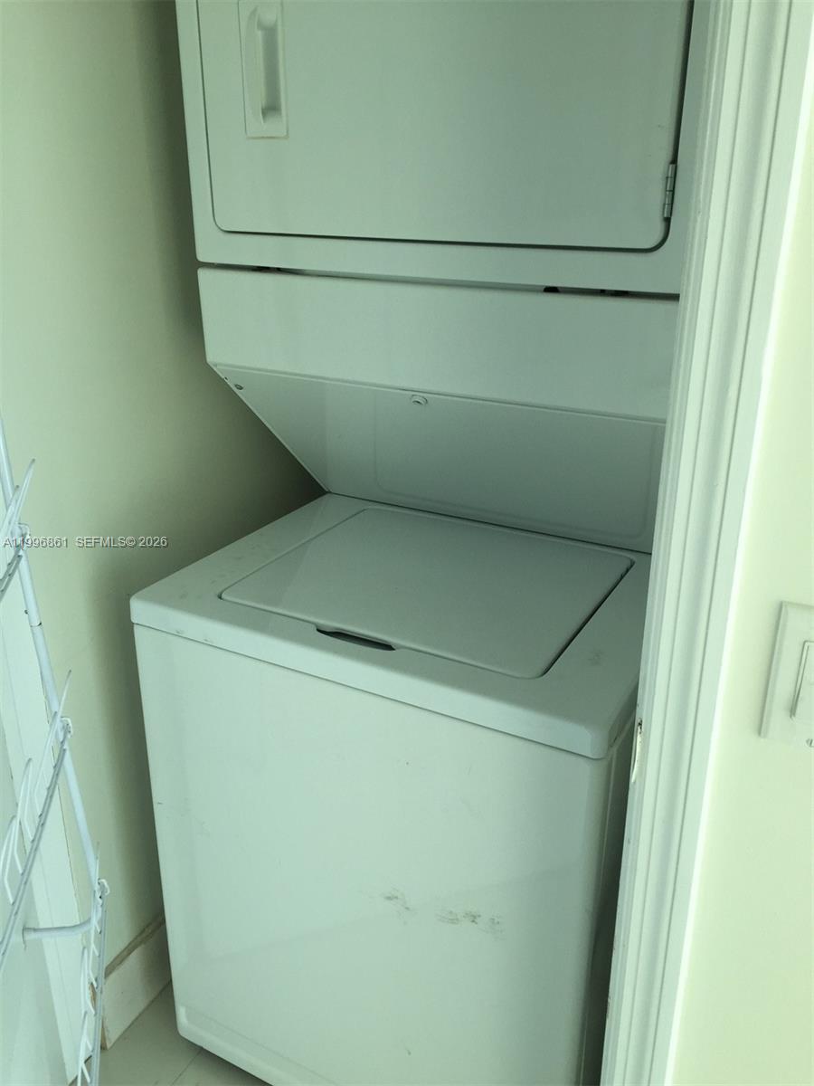 60 Southwest 13th Street, Unit 1611 Miami, FL 33130 - Photo 12 of 28 a close up view of washer and dryer