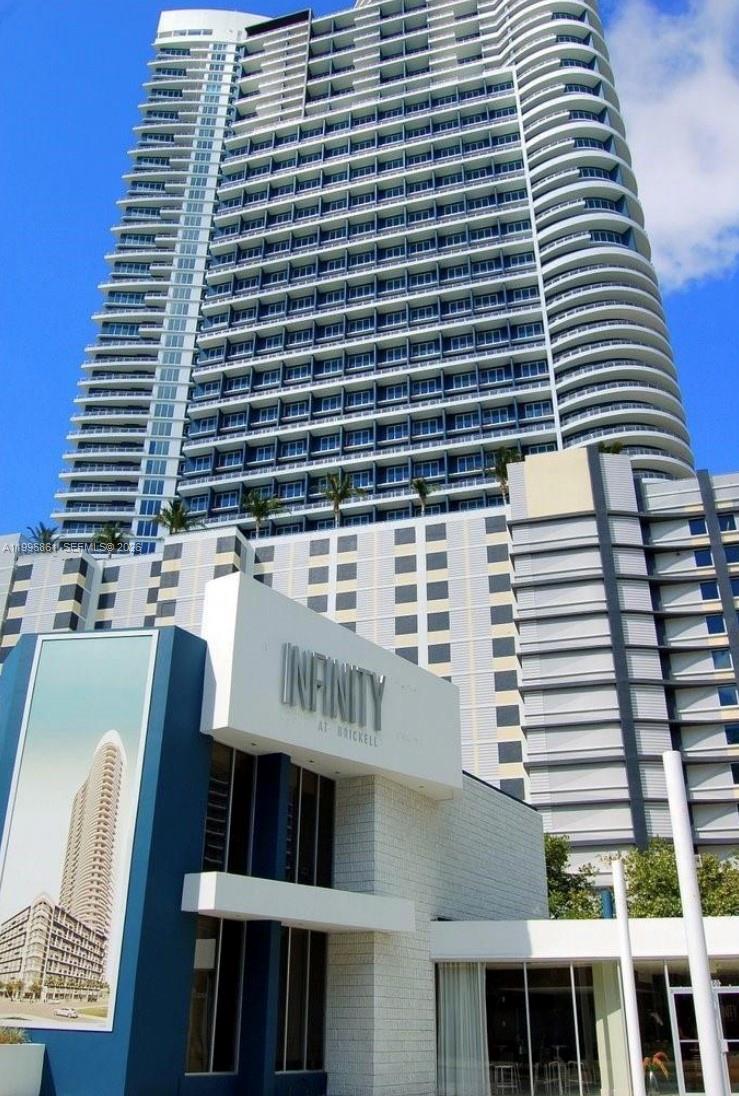 60 Southwest 13th Street, Unit 1611 Miami, FL 33130 - Photo 2 of 28 a front view of a building with glass windows