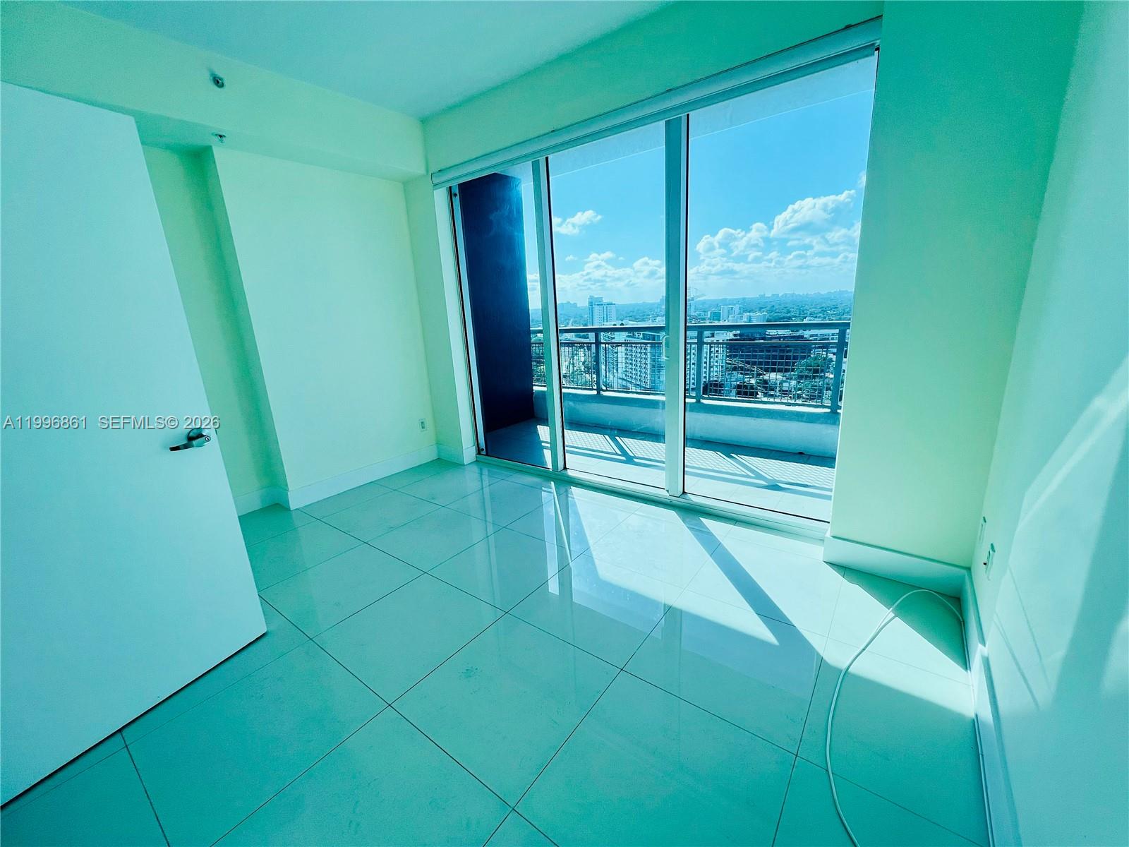 60 Southwest 13th Street, Unit 1611 Miami, FL 33130 - Photo 9 of 28 a room with window